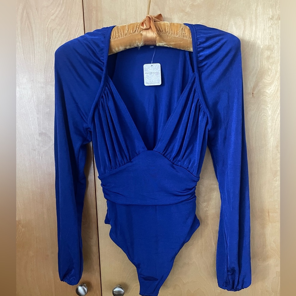 NWT! Free People ‘in your arms’ bodysuit. XS. Electric indigo. $68